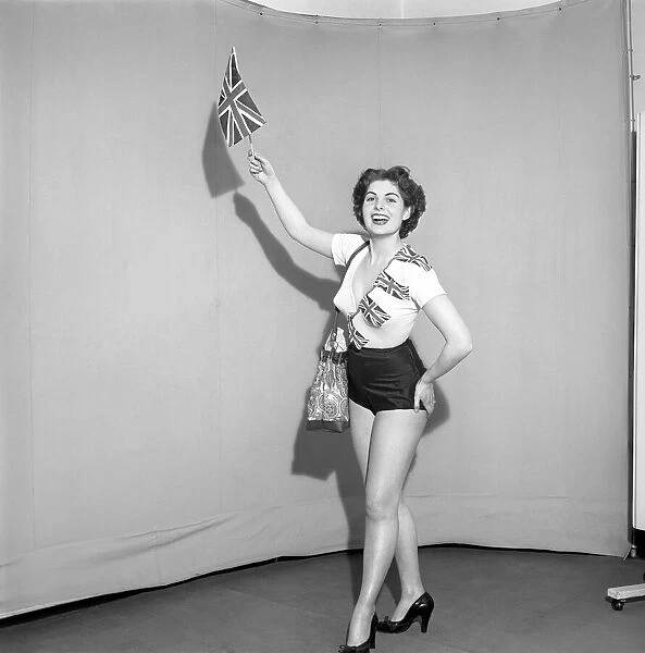 Flying the flag: Woman dress in union jack flags. 1959 E65