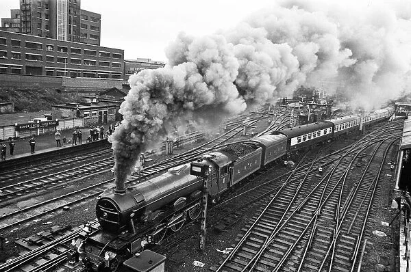 The Flying Scotsman leaving Kings Cross for the very last time. It travels to Edinburgh