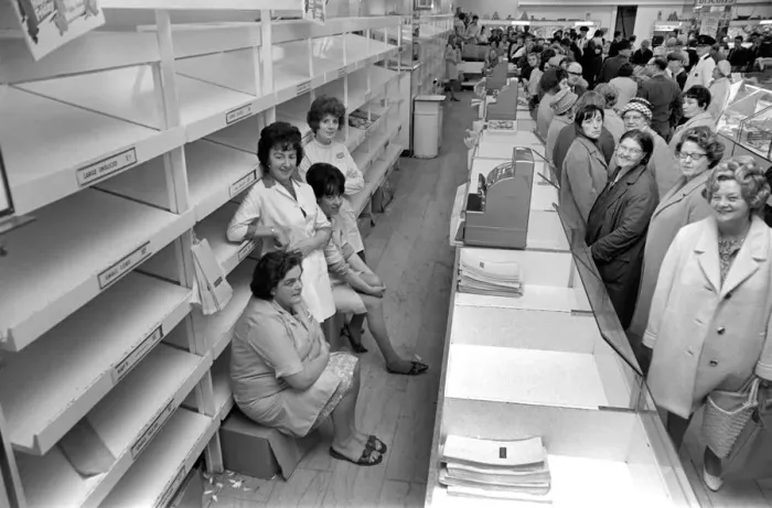 Framed Print : Food: Industrial Disputes: Scores of shoppers line the counter at Lewis