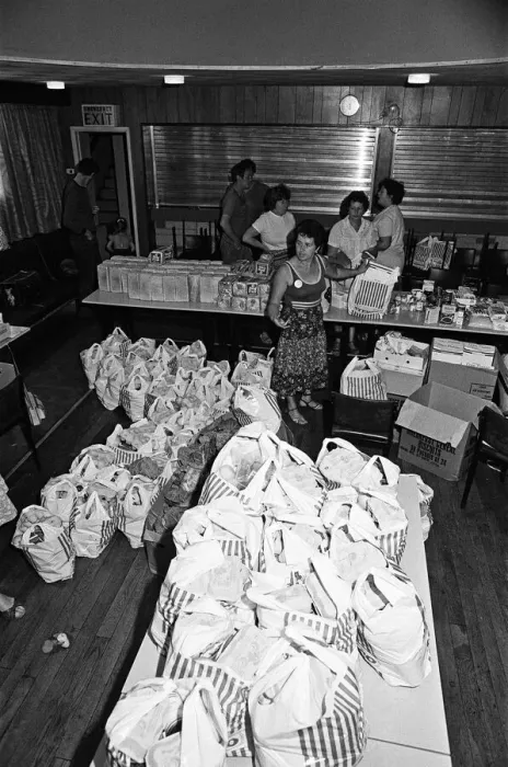 Framed Print : Food parcels being packed and distributed by the miners wives at the Community Hall Framed Print : Food parcels being packed and distributed by the miners wives at the Community Hall