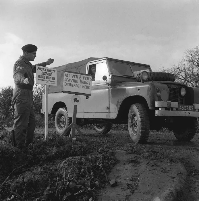Framed Print : Foot and Mouth Disease Outbreak November1967 A soldier being directed to wash down Framed Print : Foot and Mouth Disease Outbreak November1967 A soldier being directed to wash down