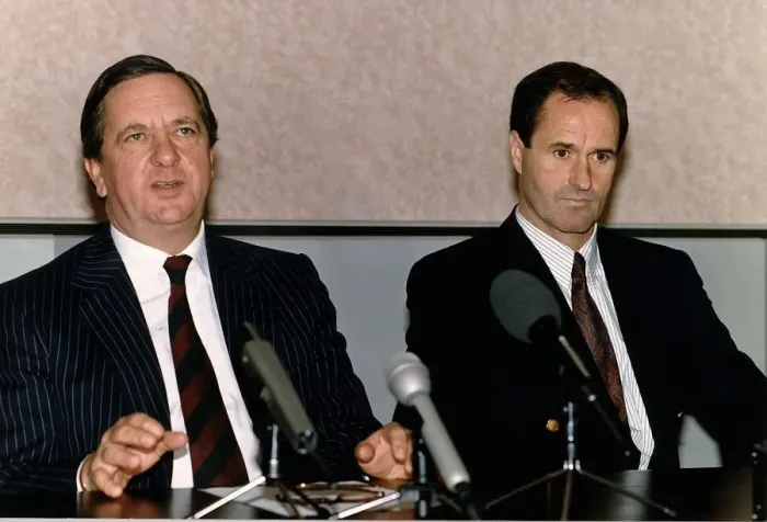 Framed Print : Football Chairman of Arsenal FC Peter Hill Wood sitting in a press conference alongside