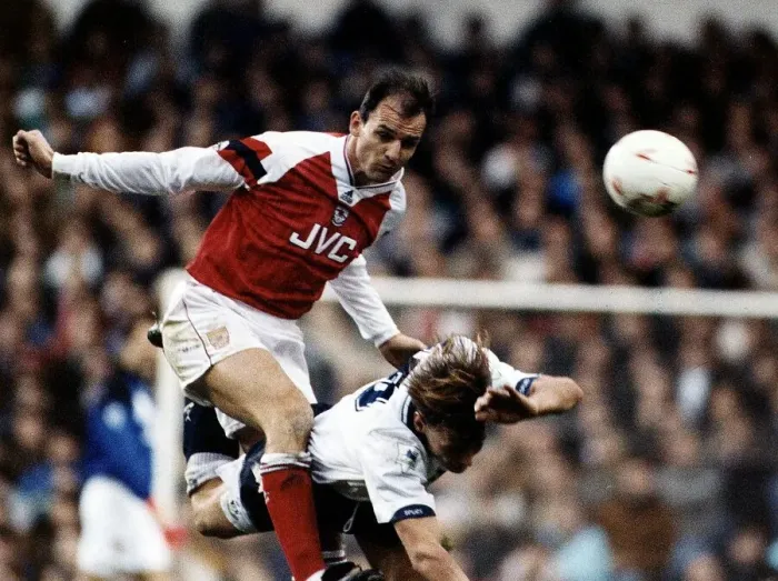 Framed Print : Football player Steve Bould for Arsenal against tackles Teddy Sheringham Framed Print : Football player Steve Bould for Arsenal against tackles Teddy Sheringham