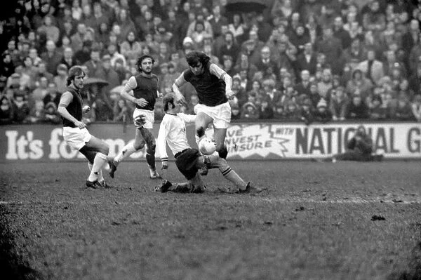 Football: West Ham vs. Burnley F. C. West Hams Keith Robson slips a tackle from Peter