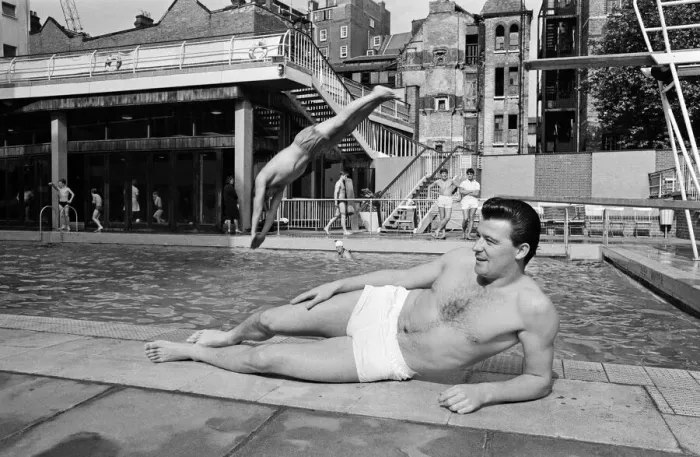 Framed Print : Footballer Johnny Byrne relaxing at oasis swimming baths. 21st August 1964 Framed Print : Footballer Johnny Byrne relaxing at oasis swimming baths. 21st August 1964