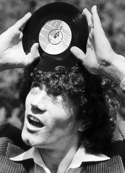 Framed Print : Footballer Kevin Keegan with the record he has cut called Head over Heels in Love