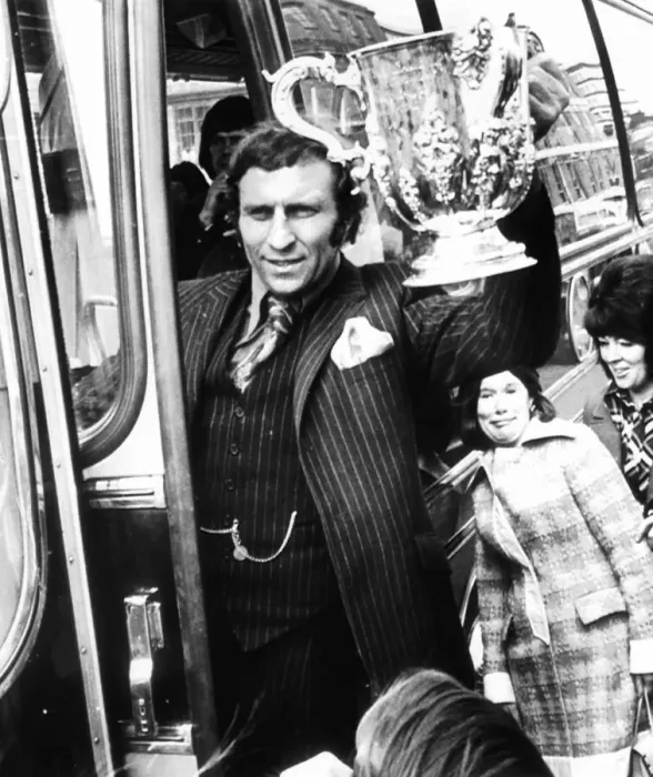 Framed Print : Footballer Mike Bailey of Wolverhampton Wanderers holds up the League Cup trophy to