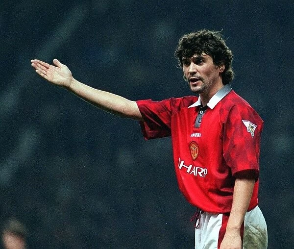 Footballer Roy Keane in action for Manchester United. January 1997