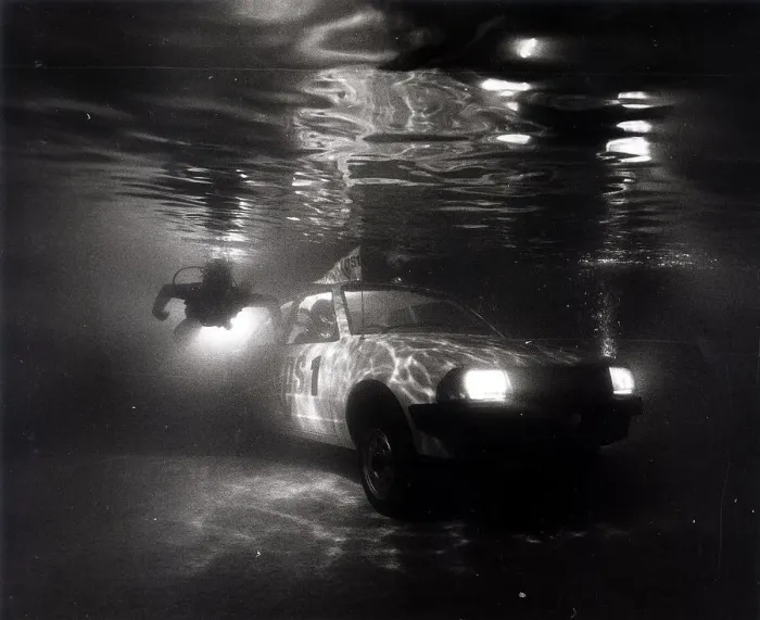 Framed Print : A Ford Escort in a swimming pool tests a new water repelant lubricant spray Framed Print : A Ford Escort in a swimming pool tests a new water repelant lubricant spray