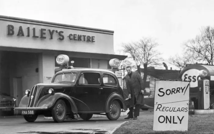 Framed Print : Ford Popular Car being filled at a Petrol Station. 27th November 1956