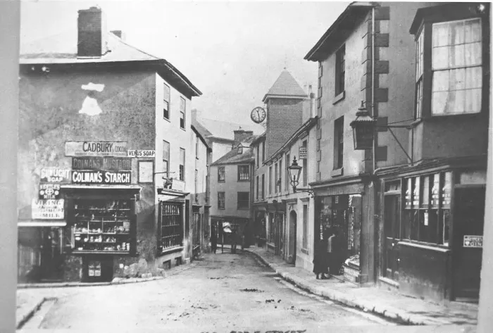 Framed Print : Fore Steet, Brixham, in the early 1900s Framed Print : Fore Steet, Brixham, in the early 1900s