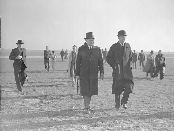 Foreign Secretary Lord Halifax (right) with a German embassy official at Heston airfield