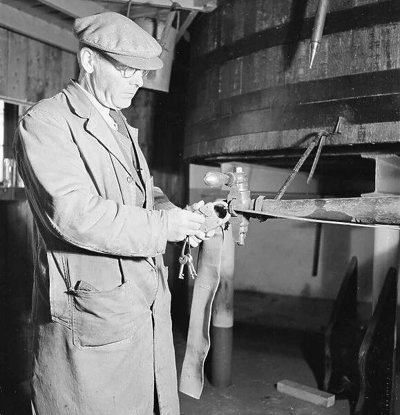Foreman at the AGlenlivet Distillery seen here unlocking the alcohol safe so sherry