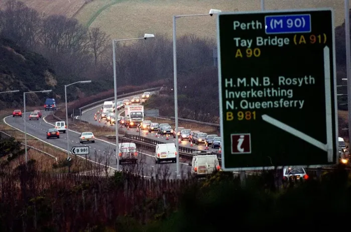 Framed Print : Forth Road Bridge traffic December 1997 heading south bound from the M90 towards