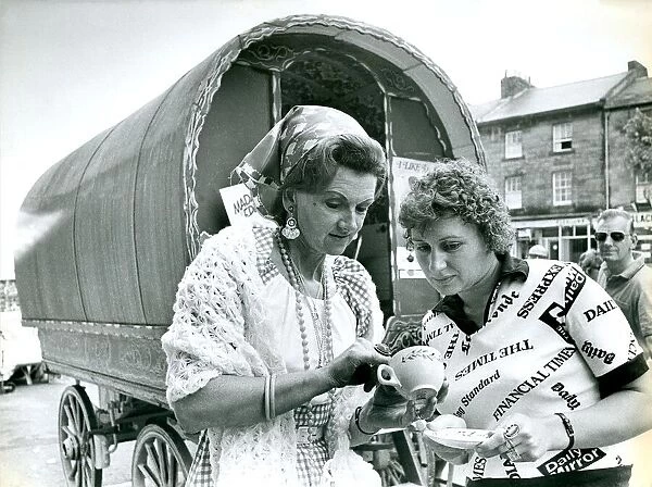 Fortune Teller Madame Edna Bellamy reading the tea leaves in 1975