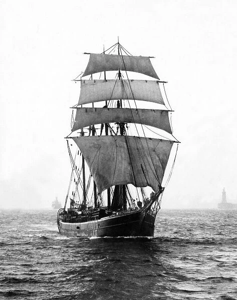 The four-masted barquentine sailing ship Helga in full sail leaving the River Tyne bound