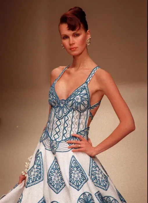 Framed Print : France Paris Fashion Week 1997 with a female model walking on catwalk wearing a Framed Print : France Paris Fashion Week 1997 with a female model walking on catwalk wearing a