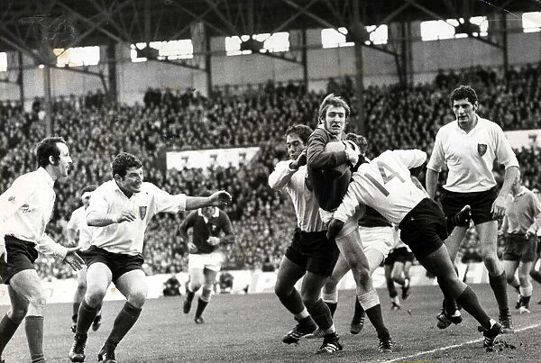 France v Wales, Stade Colombes, Paris, 27th March 1971. John Bevan, Wales being tackled
