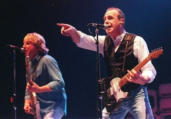 Francis Rossi of Status Quo October 1999 Makes faces at the crowd in the Clyde