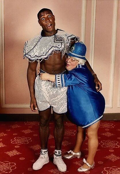 Frank Bruno Boxer with Mo of the Roly Polys starring in a Pantomime
