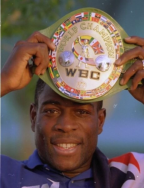 Frank Bruno displays the WBC trophy in Las Vegas at press conference for the World