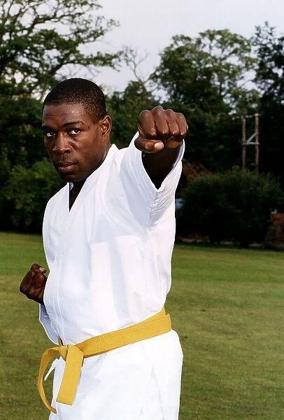 Frank Bruno ex heavyweight boxing world champion practices his karate Trainer Keith