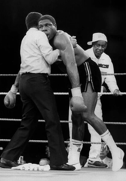 Frank Bruno out but not down in his first World Championship fight against Tim