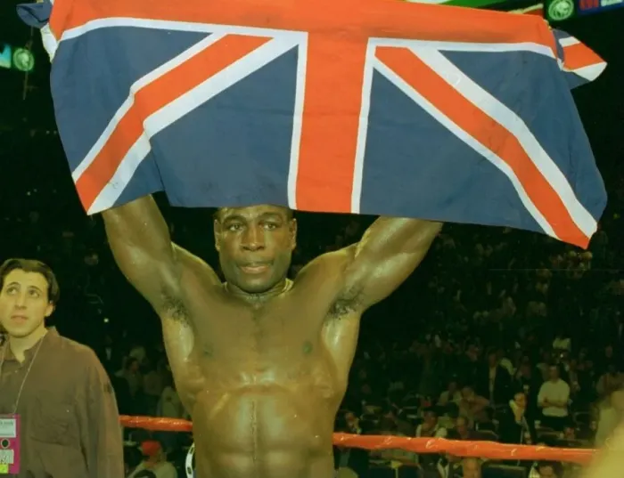 Framed Print : Frank Bruno holds up the union jack after his third round defeat at the hands of Mike Framed Print : Frank Bruno holds up the union jack after his third round defeat at the hands of Mike