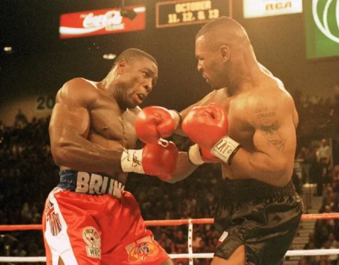 Framed Print : Frank Bruno and Mike Tyson battle it out during the WBC world title fight in Las Vegas