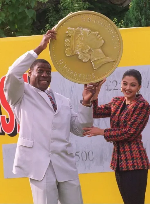 Framed Print : Frank Bruno and Miss World Aishwarya Rai launch the new Littlewoods Scratchcard whose Framed Print : Frank Bruno and Miss World Aishwarya Rai launch the new Littlewoods Scratchcard whose