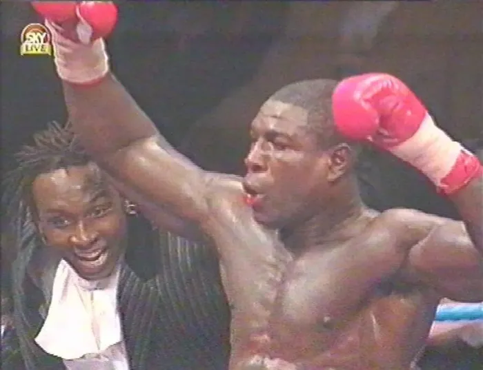 : Frank Bruno and Nigel Benn celebrate after the fight with Oliver McCall for : Frank Bruno and Nigel Benn celebrate after the fight with Oliver McCall for