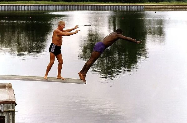 Frank Bruno Former World Heavyweight Boxer being pushed into an open air pond at
