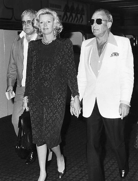 Frank Sinatra Actor and Singer with his wife Barbara Sinatra leaving Heathrow Airport by