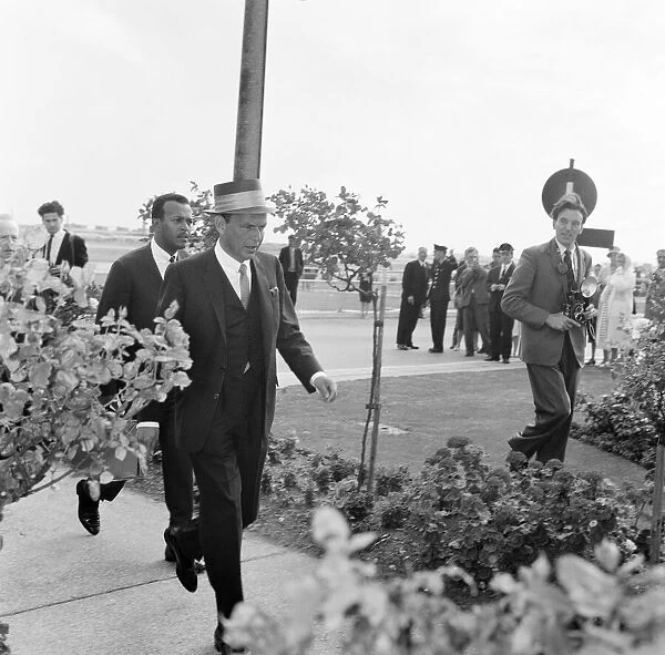 Frank Sinatra, arrives at London Heathrow Airport, from Los Angeles, 4th August 1961