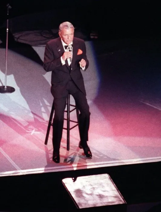 Framed Print : Frank Sinatra in concert sitting on high stool Ibrox July 1990 Glasgow