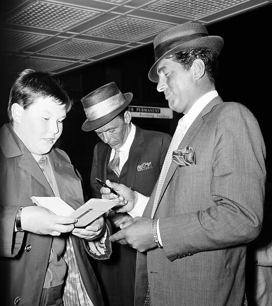 Frank Sinatra and Dean Martin, arrive at London Heathrow Airport, from Los Angeles