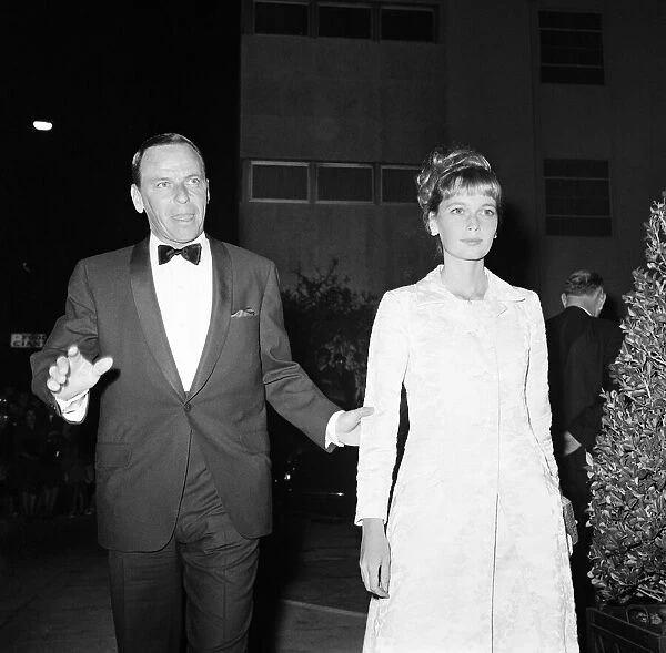 Frank Sinatra and Mia Farrow attend celebrity dinner party for guests of honour