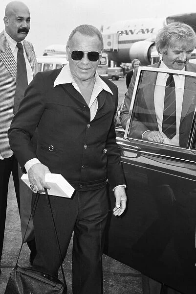 Frank Sinatra seen here at Heathrow on his way to Egypt where he is appearing in a film
