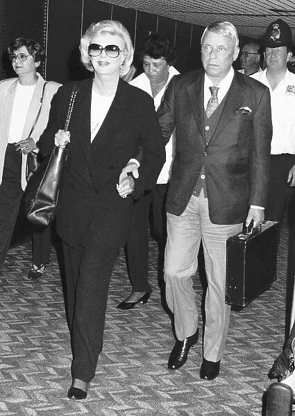 Frank Sinatra Singer Actor with wife at Heathrow Airport