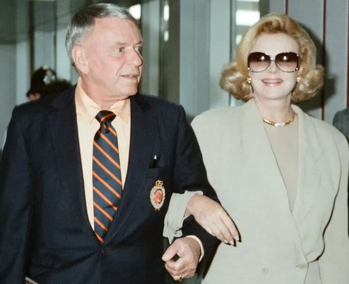 Framed Print : Frank Sinatra and wife Barbara Marx seen here arriving at Heathrow Airport 11th July 1990