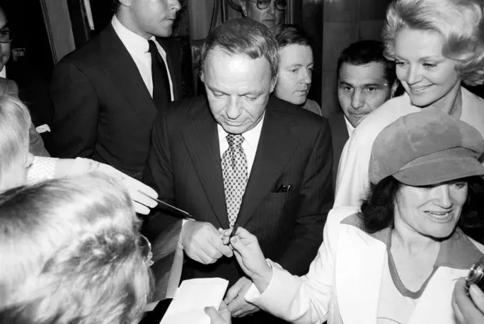 Framed Print : Frank Sintara and his girlfriend Barbara Marx leaving Claridges on the way to Mirabellas Framed Print : Frank Sintara and his girlfriend Barbara Marx leaving Claridges on the way to Mirabellas
