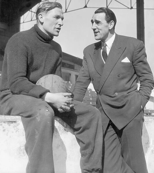 Frank Swift (Right) former Manchester Goalkeeper seen here talking with Bert Trautmann