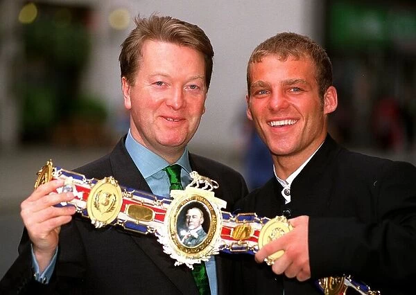 Frank Warren boxing promoter with British champion Ryan Rhodes announcing plans for