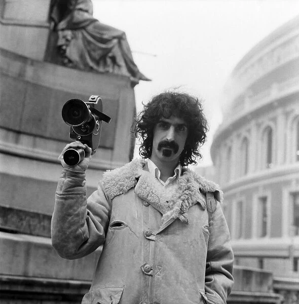 Frank Zappa and his movie camera at the Royal Albert Hall. February 1971 71-12000-001