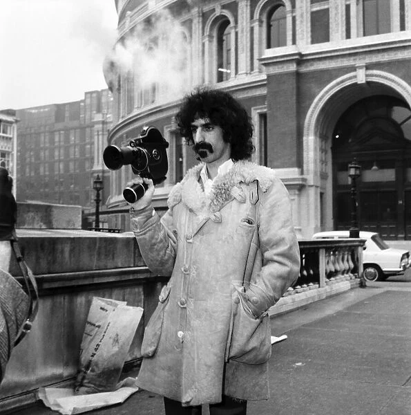Frank Zappa and his movie camera at the Royal Albert Hall. February 1971 71-12000-004