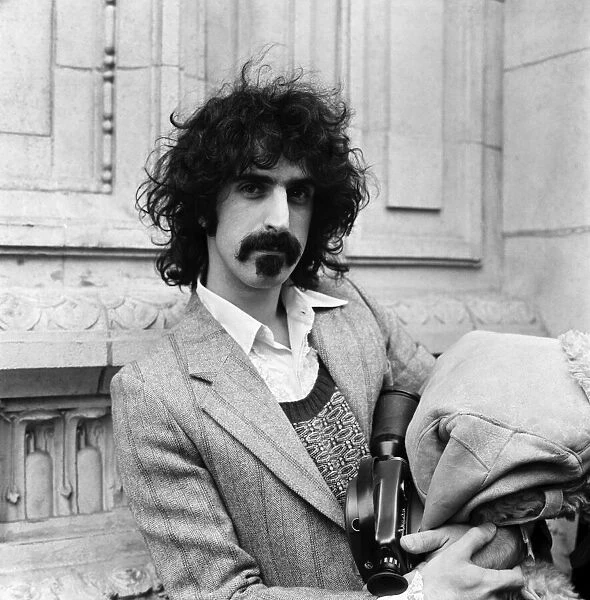 Frank Zappa and his movie camera at the Royal Albert Hall. February 1971 71-12000-005