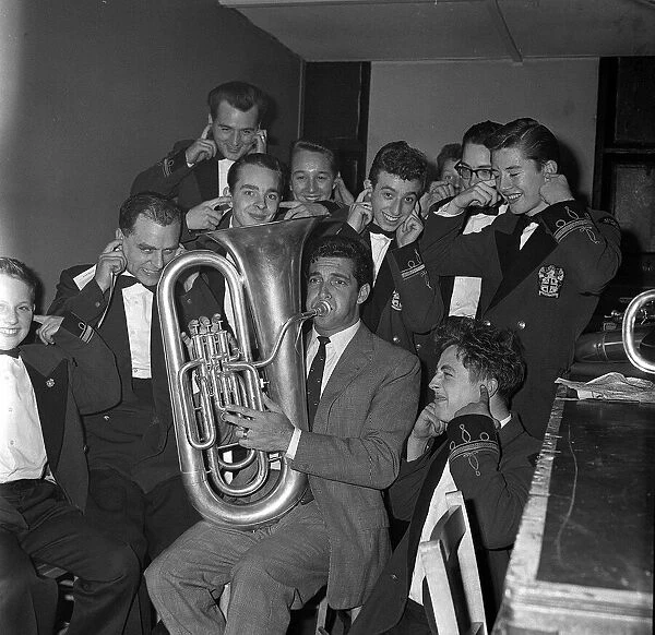 Frankie Vaughan Oct 1962 plays tuba at the Anfield Boys club