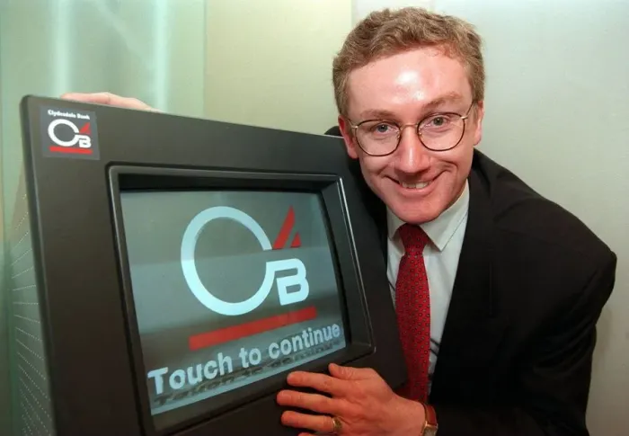 Framed Print : Fred Goodwin, chief executive of the Clydesdale Bank, pictured at their new branch in St