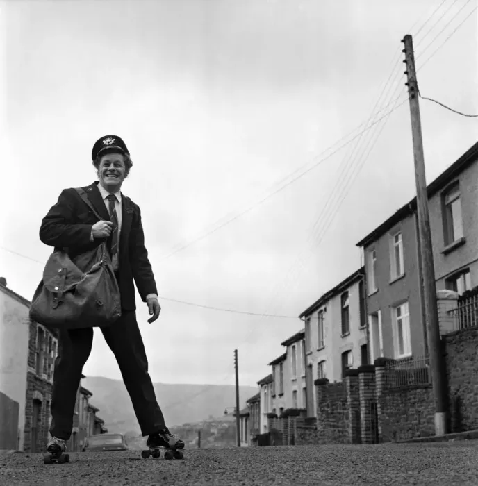 Framed Print : Fred Henderson, 49, makes speedy deliveries with the local post with balletic leaps along Framed Print : Fred Henderson, 49, makes speedy deliveries with the local post with balletic leaps along