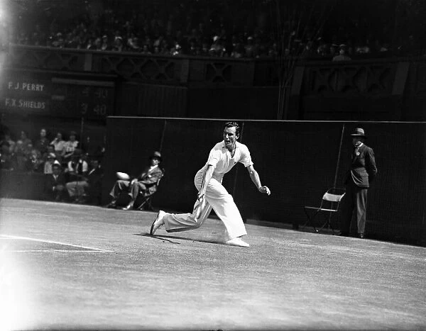 Fred Perry competing at Wimbledon Centre Court, during the final match of The 1934 Davis